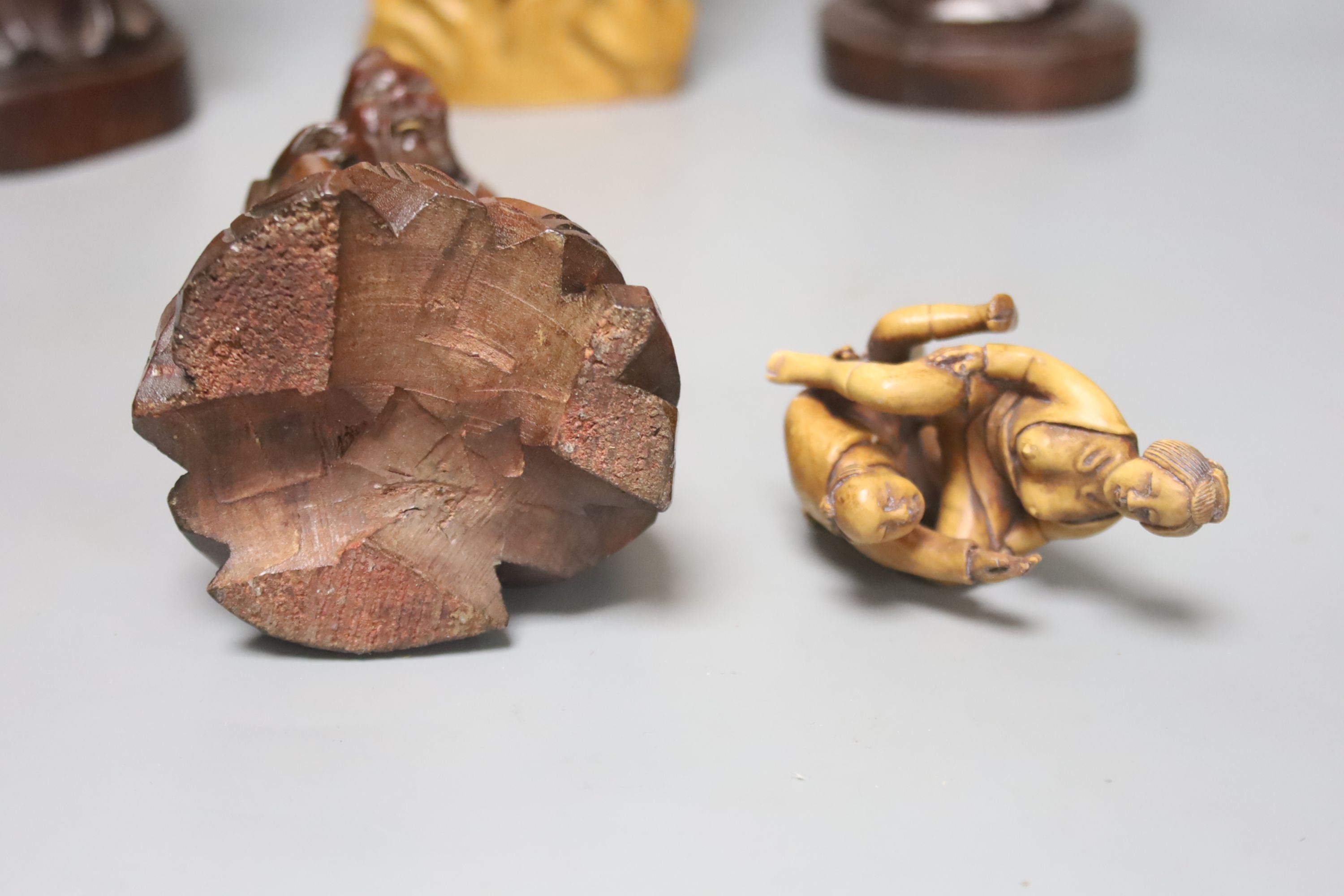 A collection of Chinese and Japanese wooden carvings to include an erotic netsuke (7)